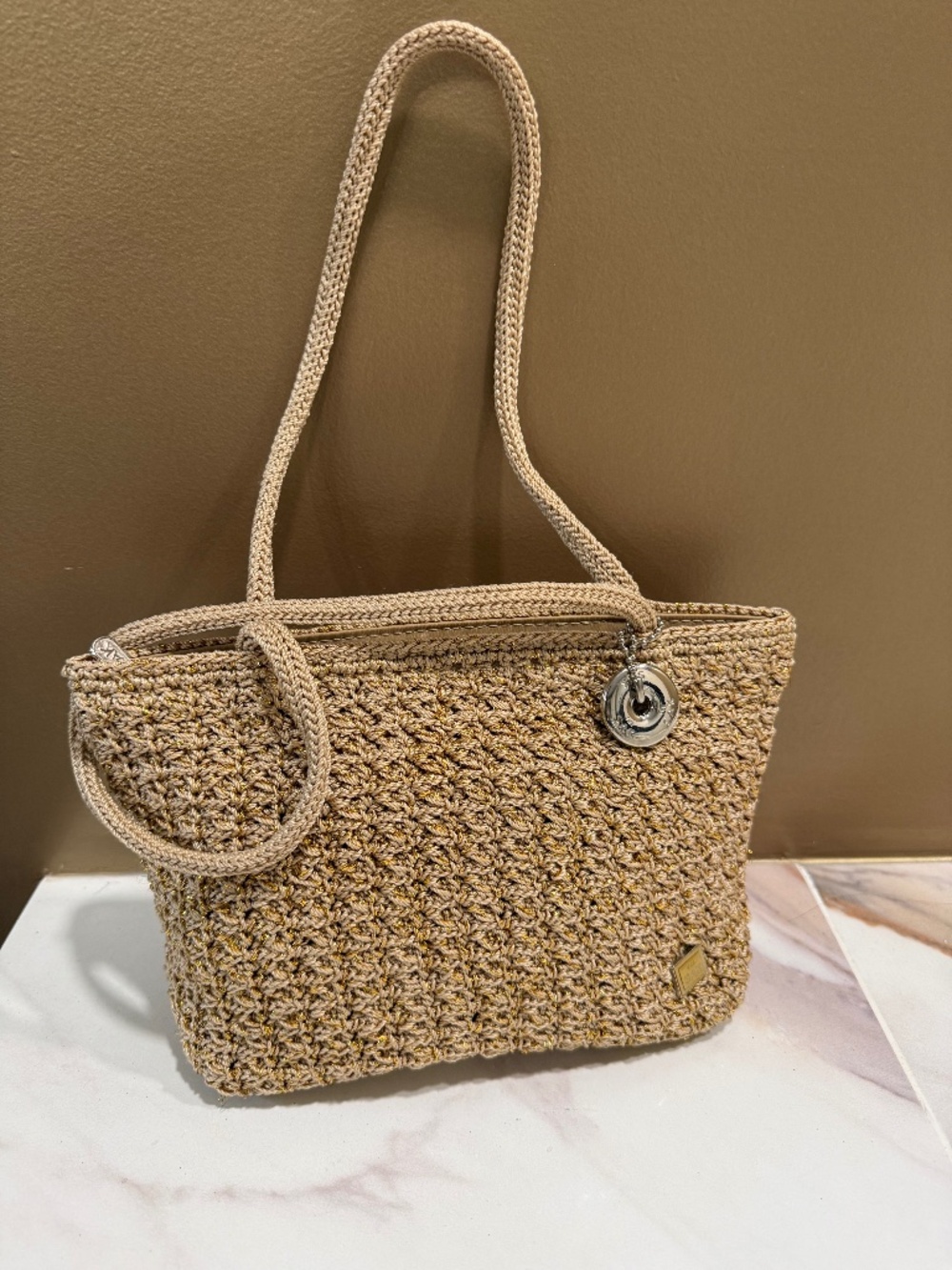 The Sak classic crocheted small bag, natural color with silver trim